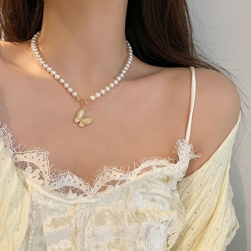 Vòng cổ xỏ hạt ngọc trai giả mặt hình bươm bướm kiểu Hàn Quốc thời trang cho nữ