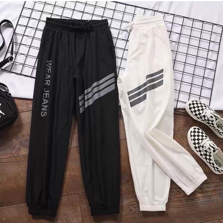 Quần jogger nữ Fmstyle shop quần thể thao ống rộng bo gấu cá tính phối 3 sọc chéo 205090041