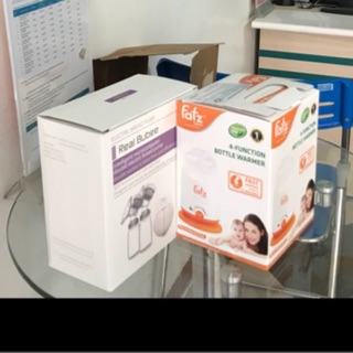 Máy hút sữa Real bubee và 50 túi trữ sữa sunmum km
