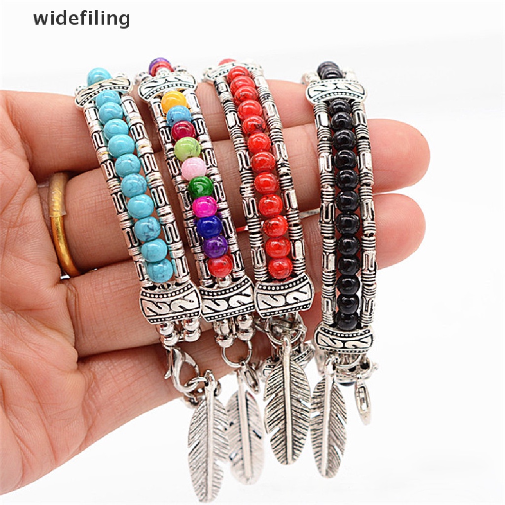 Vòng tay bạc xỏ hạt mặt dây hình lông vũ phong cách Bohemian thời trang cho nữ