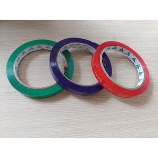 Băng keo rộng 12mm - dây buộc đầu túi- niêm phong đầu túi siêu thị - nhà sách - cửa hàng bách hóa- có in chữ