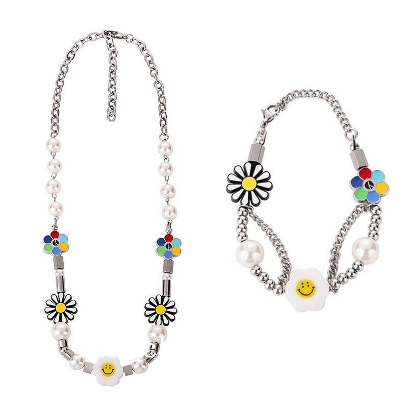 Dây chuyền/Vòng tay mặt hoa cúc và mặt cười làm từ thép titan cao cấp