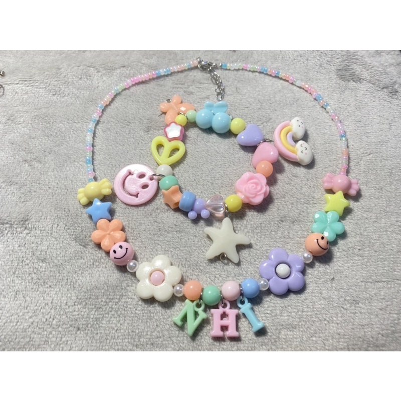 Bộ vòng tay và vòng cổ gắn tên theo yêu cầu