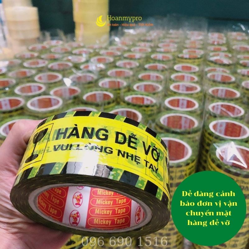 Băng dính hàng dễ vỡ 1 cây 6 cuộn nặng 1,2kg màu vàng đen