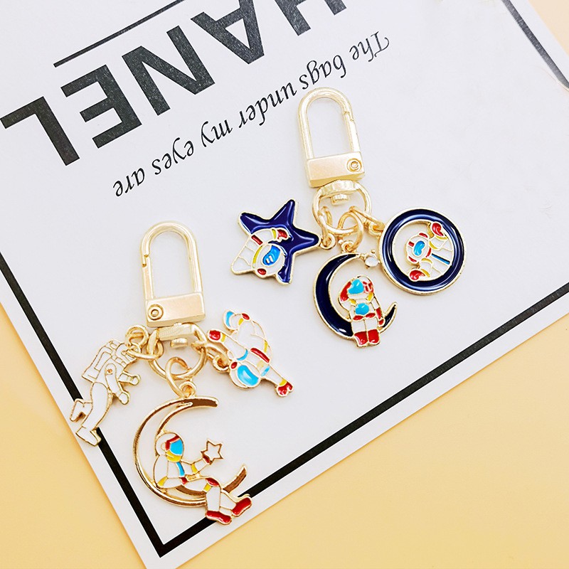 Móc khóa điện thoại hình phi hành gia dễ thương
