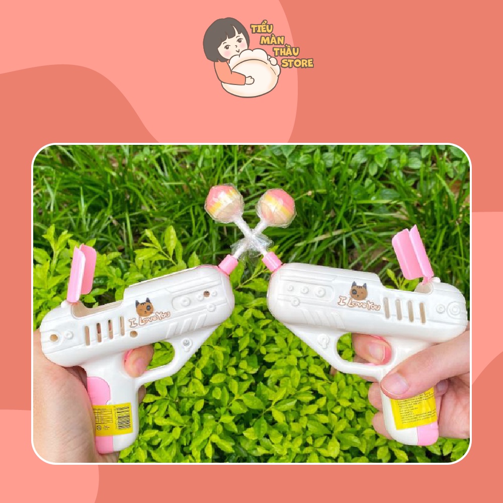 Súng bắn kẹo mút tặng kèm kẹo mút cho trẻ em - Tiểu Màn Thầu Store