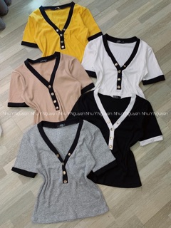 Áo thun gân viền cổ nút bấm