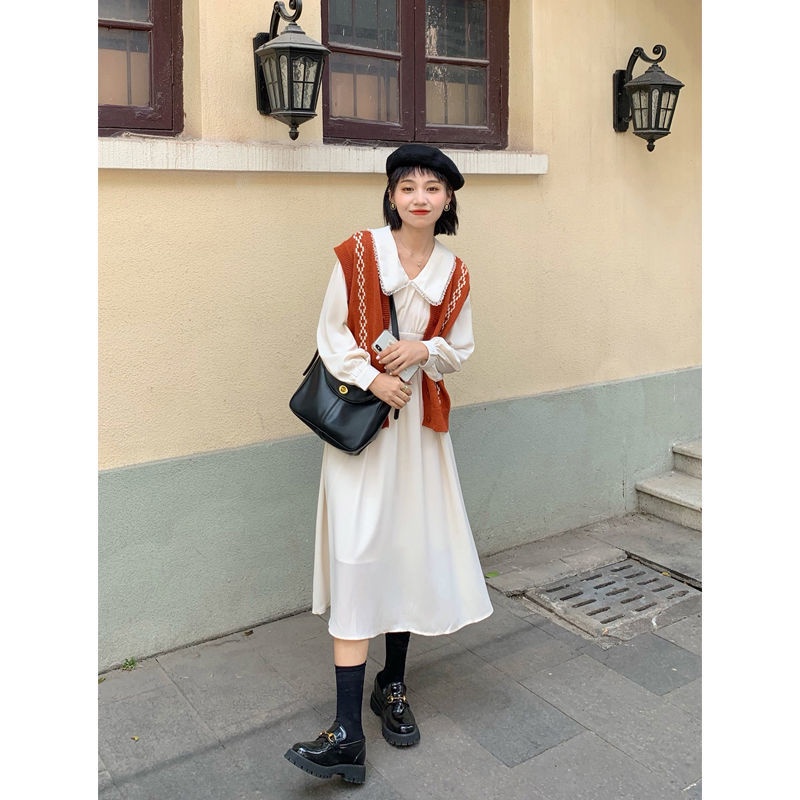 Áo Dệt Kim Sát Nách Cổ Chữ V Màu Cam Phong Cách Retro Thời Trang Cho Nữ