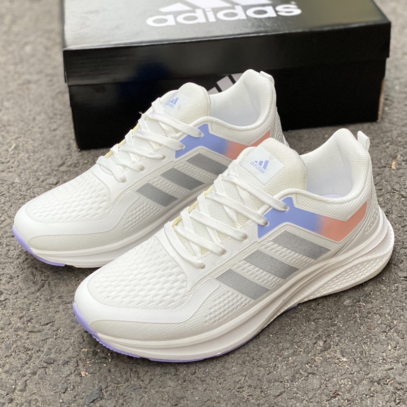 Giày chạy bộ nữ trắng phối tím