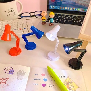 Đèn bàn minisize cầm tay tiện lợi