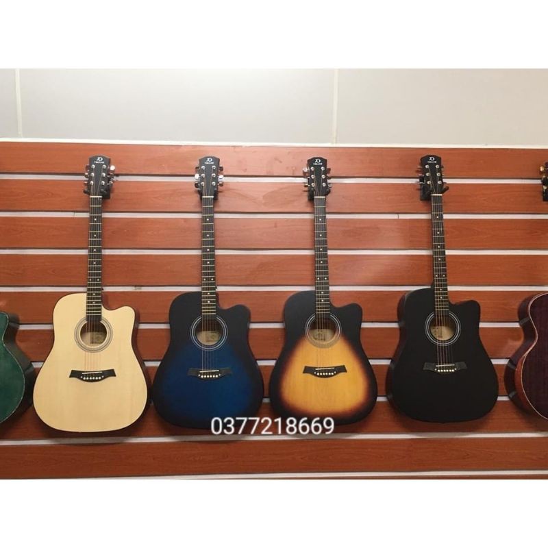 Đàn Guitar Acoustic Tokado gỗ hồng đào có ty. Full bao da ,capo,dây dự phòng