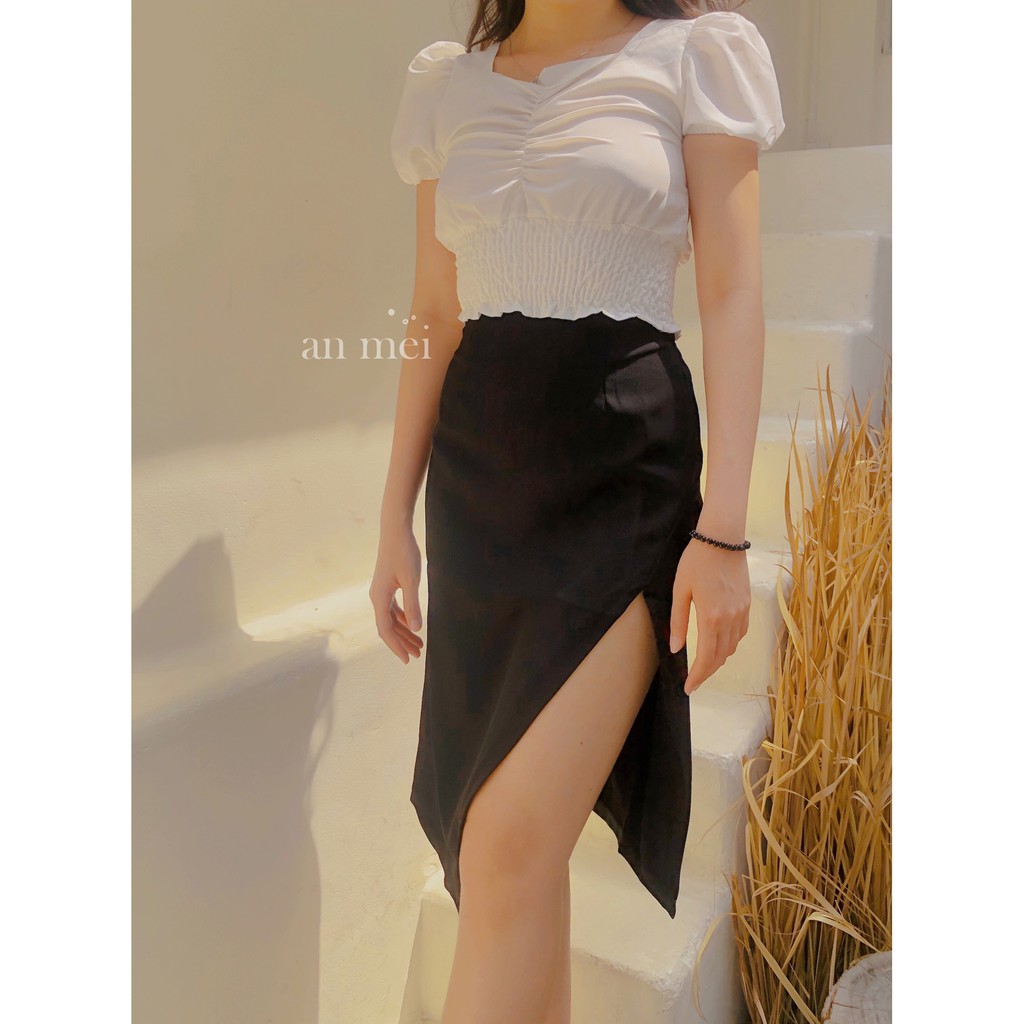 Set áo trắng kiểu, chân váy đen xẻ tà