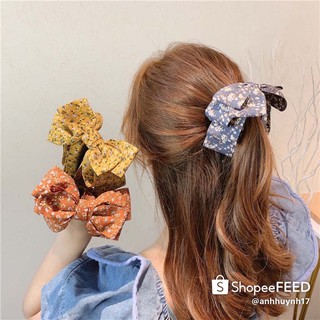 Kẹp tóc dáng dọc làm phồng tóc đính nơ vải voan hoa