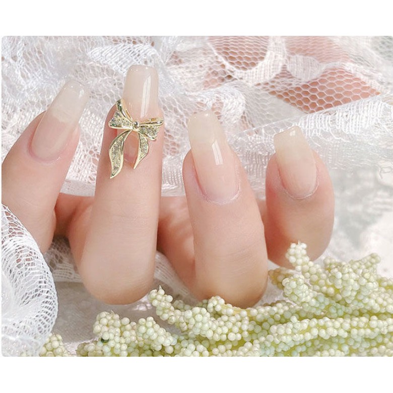 Charm nơ đính móng