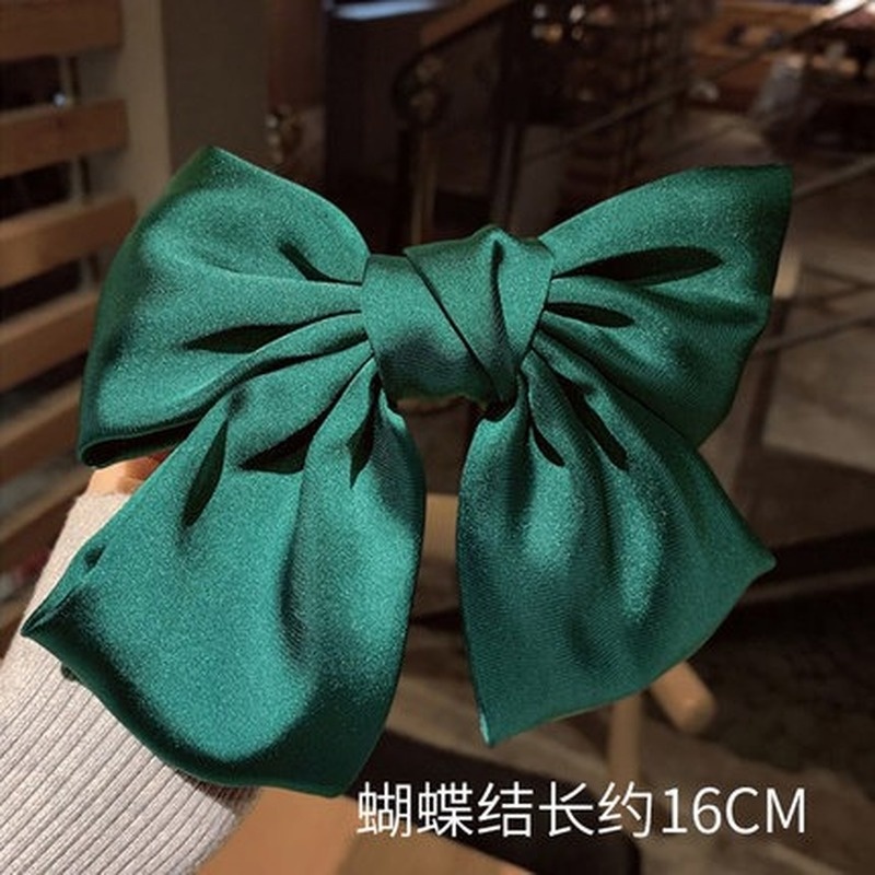 Kẹp tóc đính nơ đỏ thời trang mùa xuân xinh xắn