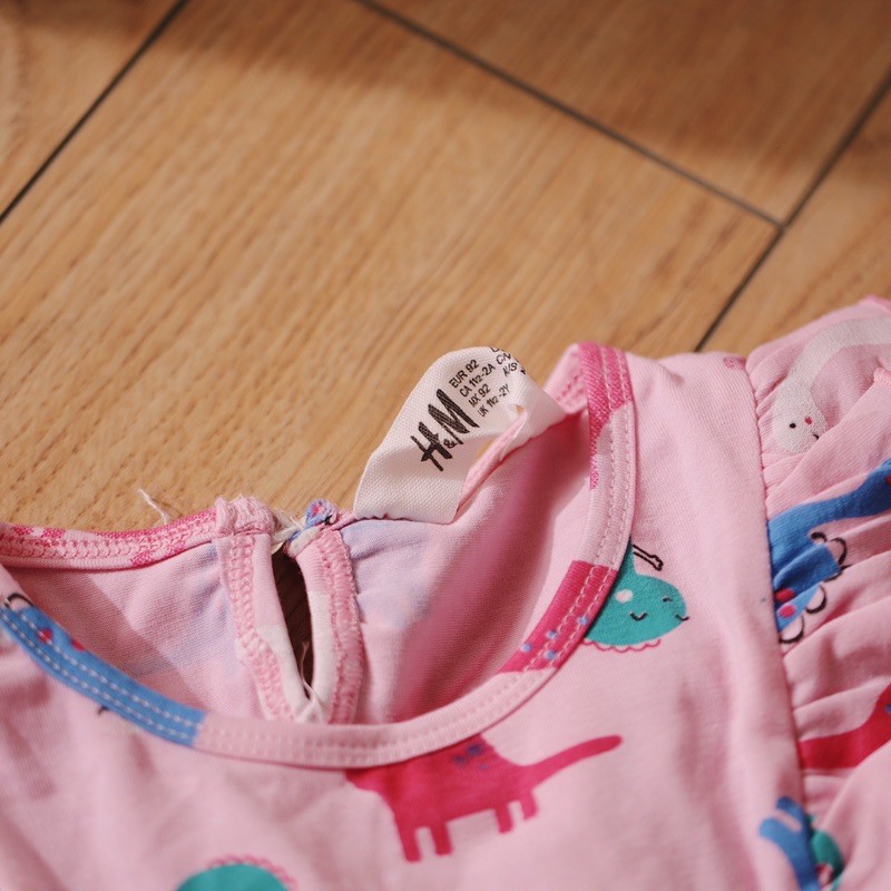 Váy hồng khủng long bé gái Hm