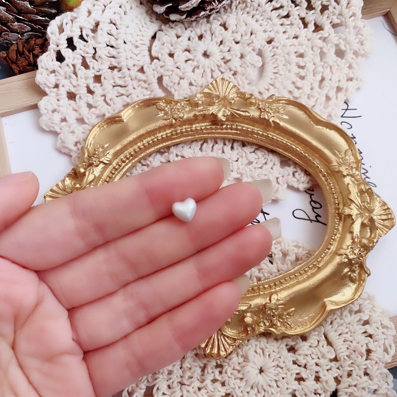 Khuyên thép y tế tim màu