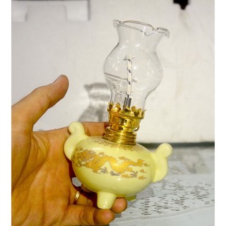 đèn dầu sứ rồng vàng