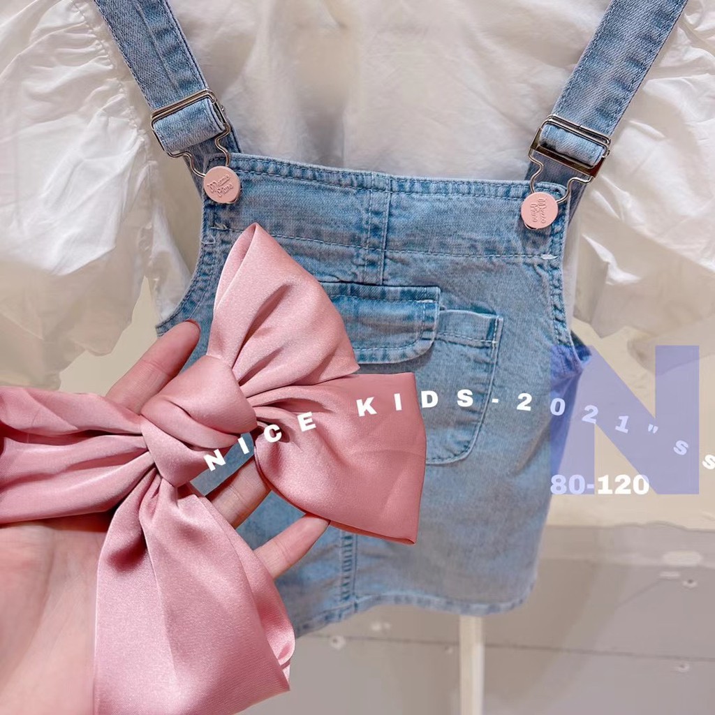 Đầm yếm denim đính nơ thắt xinh xắn thời trang dành cho bé gái
