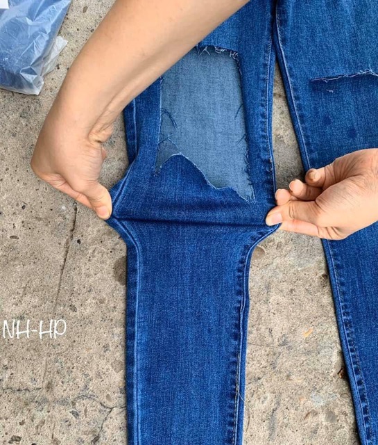 Quần jeans cạp cao xanh rách gối