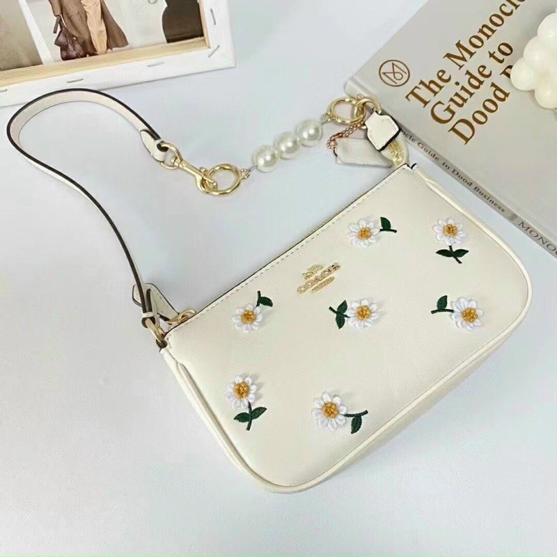 TÚI COACH NOLITA HOA CÚC