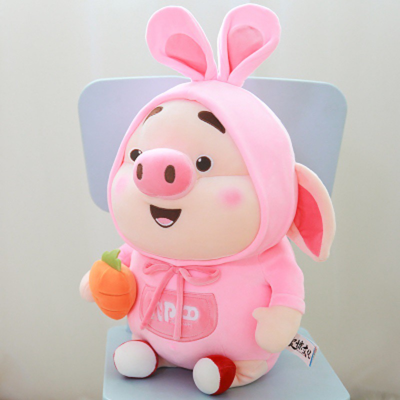 Thú bông heo tik tok mang áo thỏ cầm carot