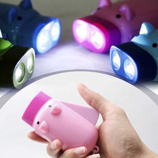 Đèn pin tự sạc bằng tay hình con lợn kute