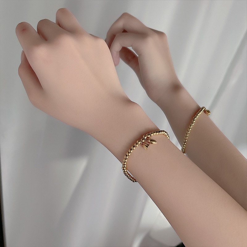 Vòng Tay Hạt Tròn Nhỏ Bằng Thép Titanium Mạ Vàng 18k Thời Trang Đơn Giản