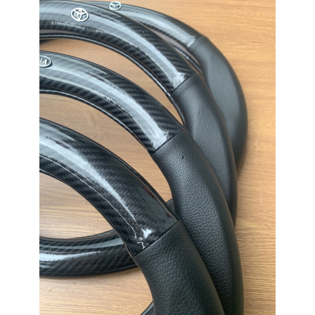 Bọc vô lăng Cacbon CAO CẤP có logo hãng xe
