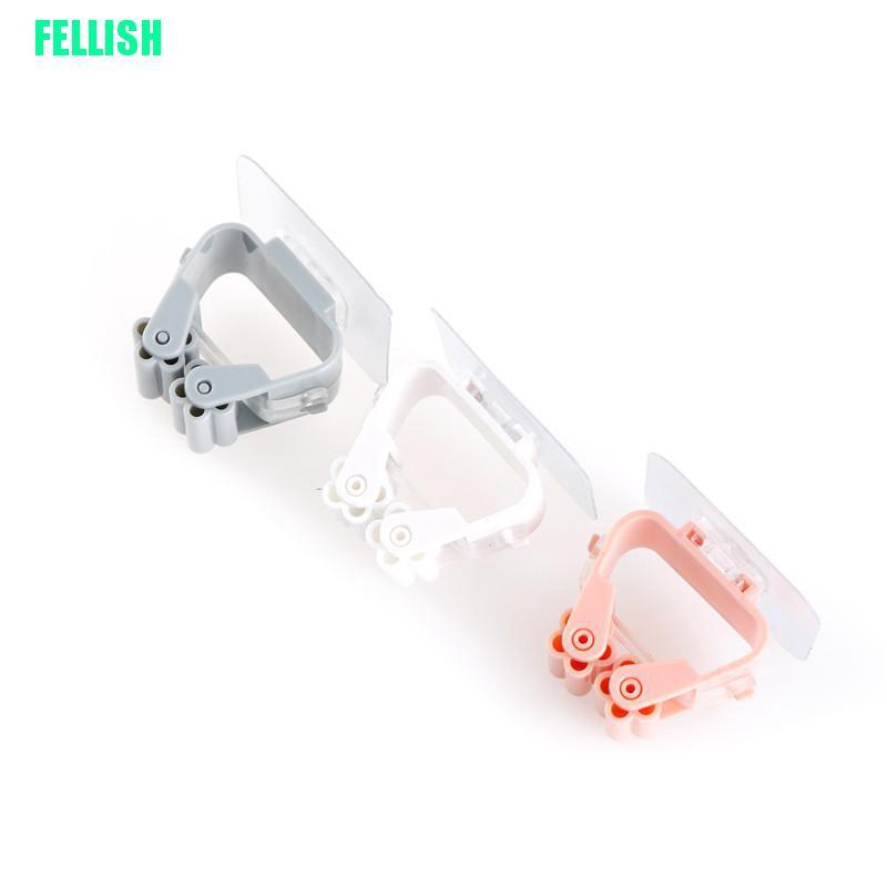 Giá treo cây lau nhà dán tường tiện lợi