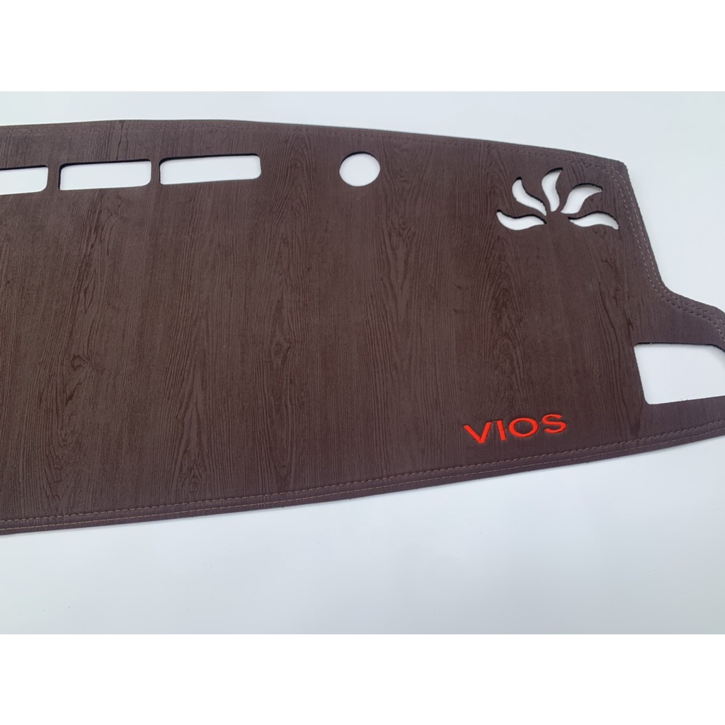 Thảm taplo da vân gỗ Vios 2019 - 2022, thảm taplo da vân gỗ may thiết kế theo xe Vios 2019 - 2022 cao cấp hàng dày đẹp