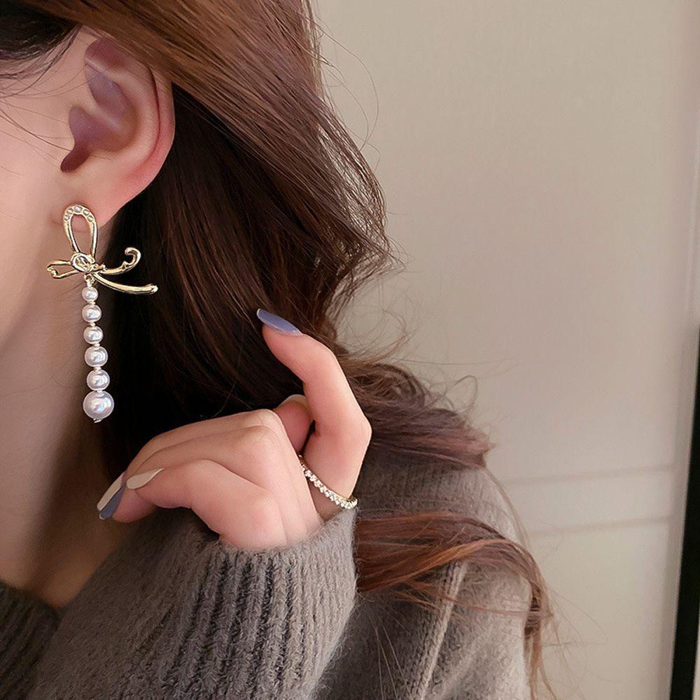 Bông Tai Dáng Dài Đính Nơ Phối Tua Rua Thời Trang Cho Nữ