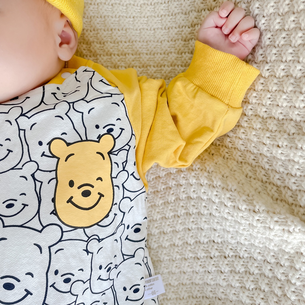 Bộ áo liền quần tay dài in hình gấu pooh dễ thương dành cho bé sơ sinh