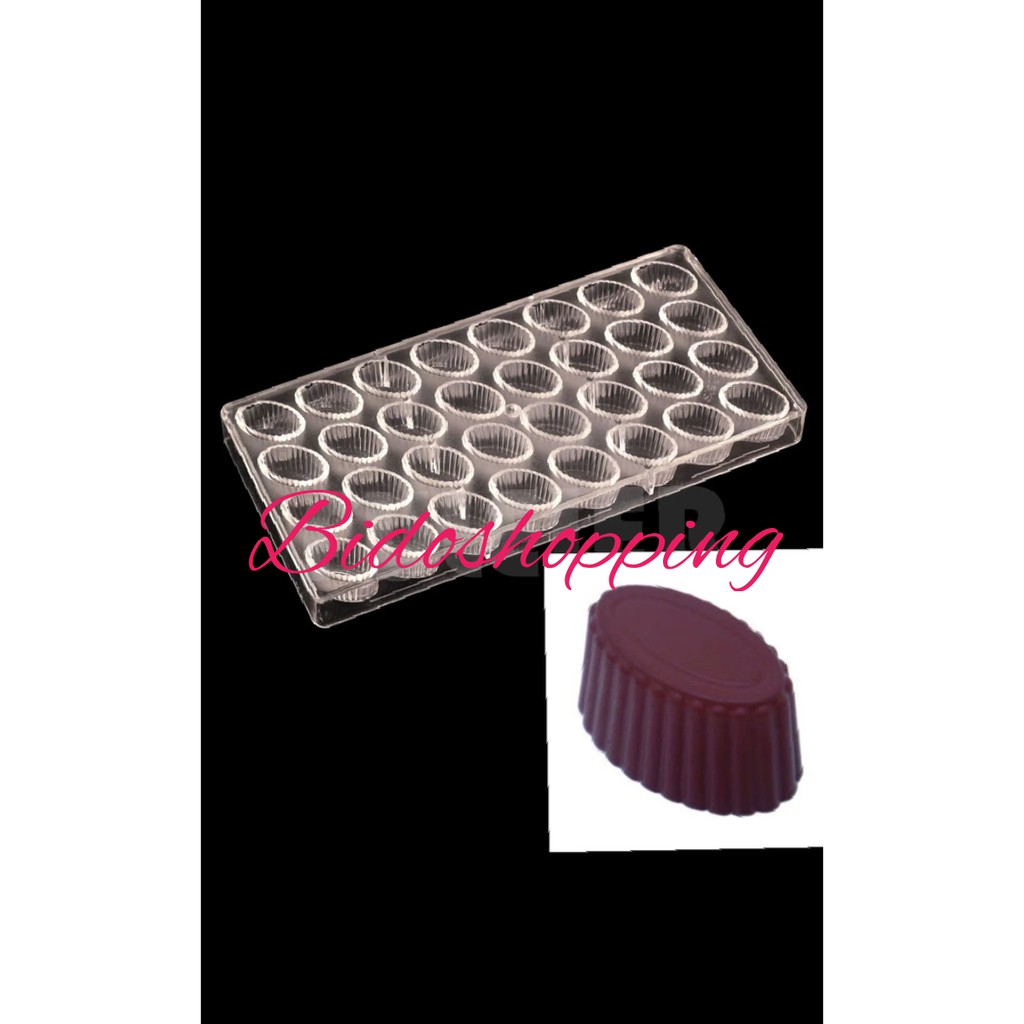 Khuôn sô cô la nhựa cứng hình oval cạnh kẻ sọc 2167
