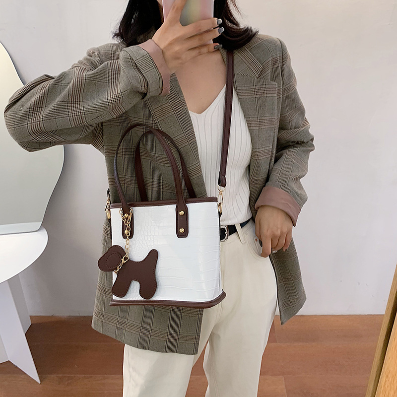 Túi xách thiết kế giản dị thời trang sành điệu cho nữ