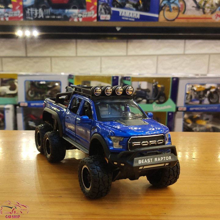 Mô hình xe ô tô Ford F150 Raptor 6x6 tỉ lệ 1:28 màu xanh