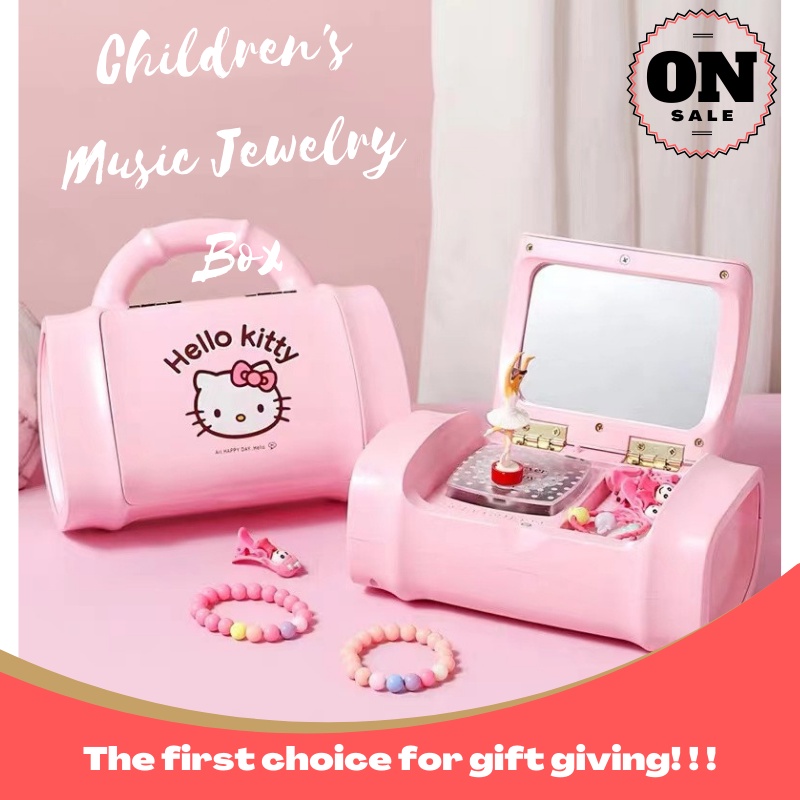 Hộp Nhạc Hello Kitty Cầm Tay Xoay Vòng Sáng Tạo Nhiều Màu Sắc Cho Bé
