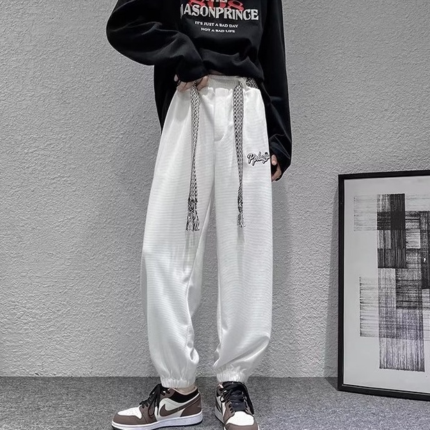Quần  dài dây rút màu trơn chất liệu lụa lạnh thời trang mùa hè phong cách hàn quốc cho nam chữ in màu quần dài đơn giản phù hợp với tất cả các cặp quần dài