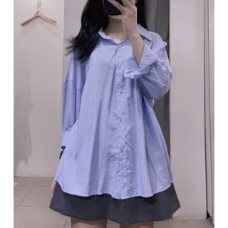 Áo sơ mi xanh cúc vạt