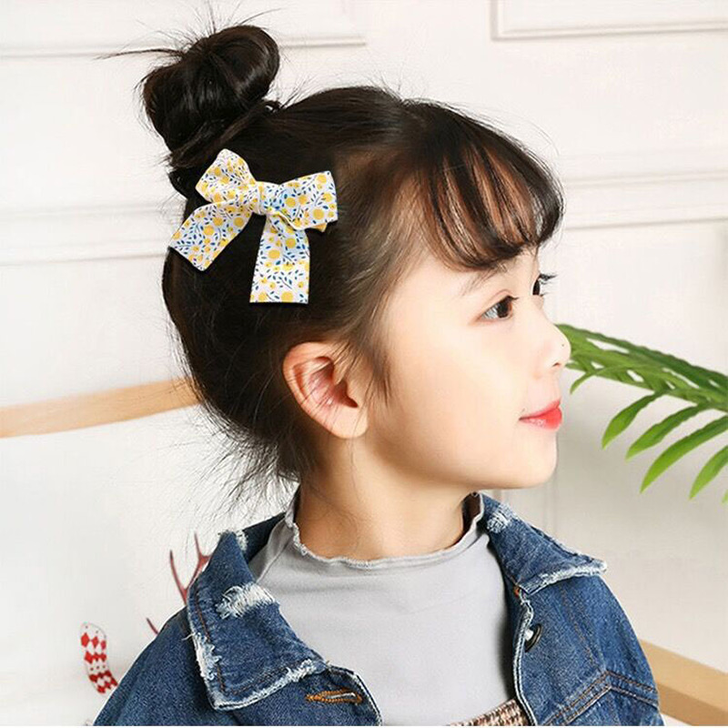 Set 2 kẹp tóc hình nơ dễ thương cho bé gái