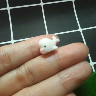 Charm cá heo trắng làm slime