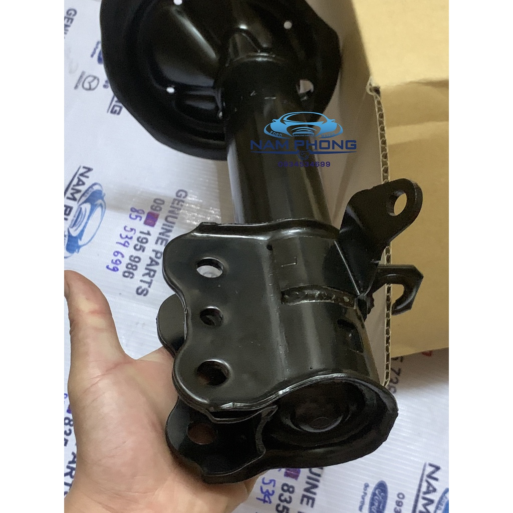 Giảm sóc sau Laser Mazda 323 Premasi bên lái LH - BVJE28900 / BL5P28900 / BK2J28900E / BK2J28900G