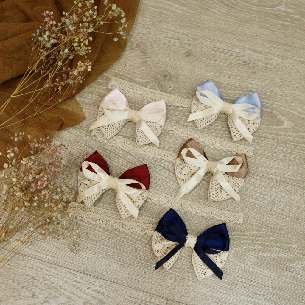 Băng đô nơ ren phối sang chảnh cho bé.