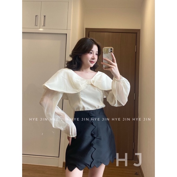 Áo sơ mi tay bồng nơ bánh bèo mix chân váy tafta lượn sóng