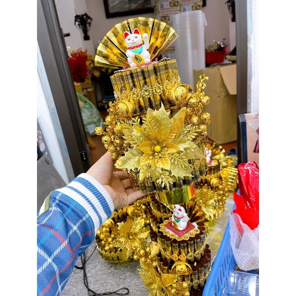 THÁP TIỀN MÈO THẦN TÀI VẪY TAY