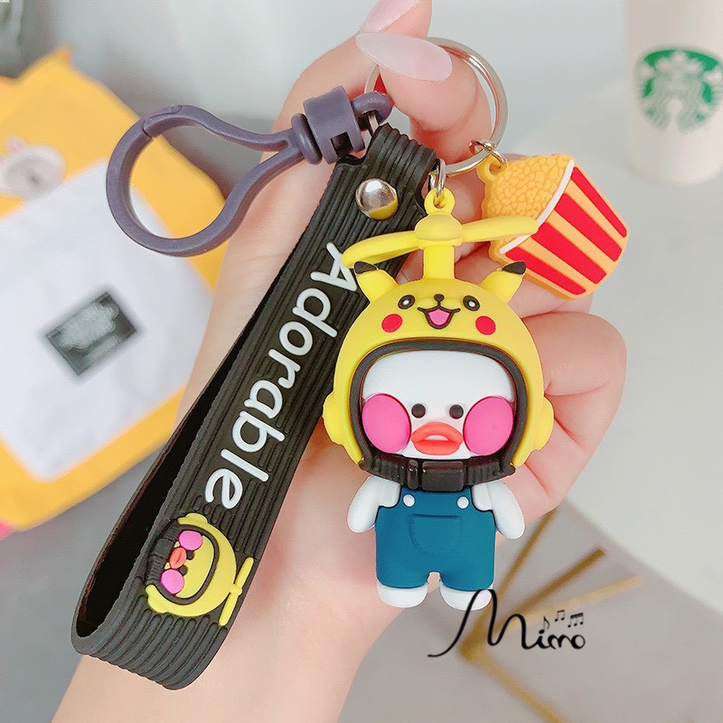 Móc khoá vịt môi tều đội mũ bảo hiểm đáng yêu 2 mẫu