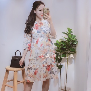 Váy xoè hoa nhí xếp ly cổ