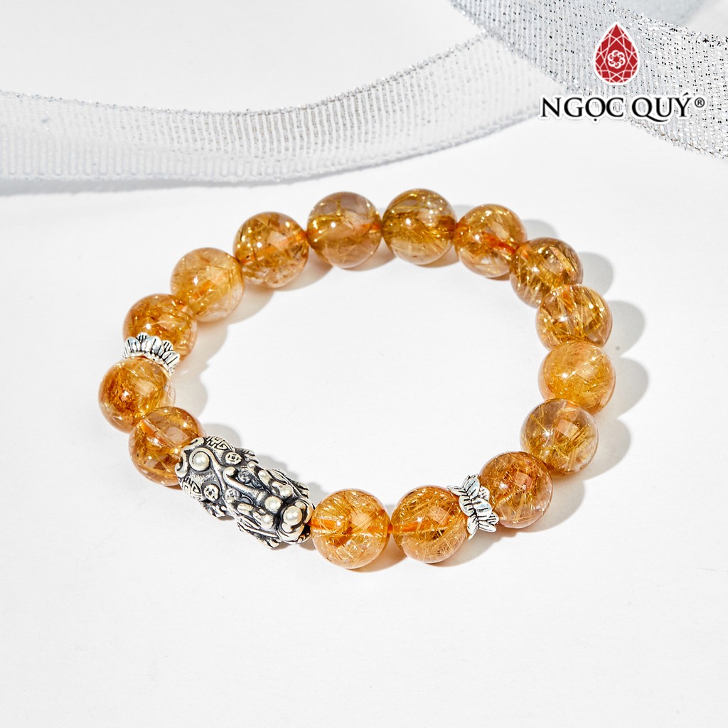 Vòng tay TA tóc vàng phối charm bạc - Ngọc Quý
