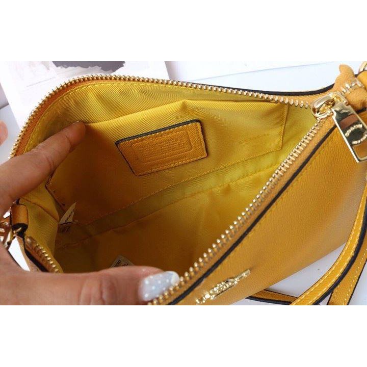 Túi coach mini vàng
