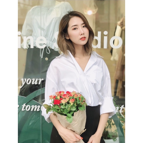 Áo sơ mi oversized dáng rộng cúc lệch cá tính dành cho nữ Cafeine Studio